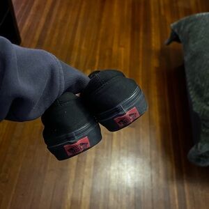 Vans Black Sneakers with Red Accents